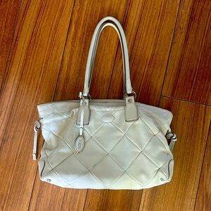 Tod’s quilted drawstring bone cream color.